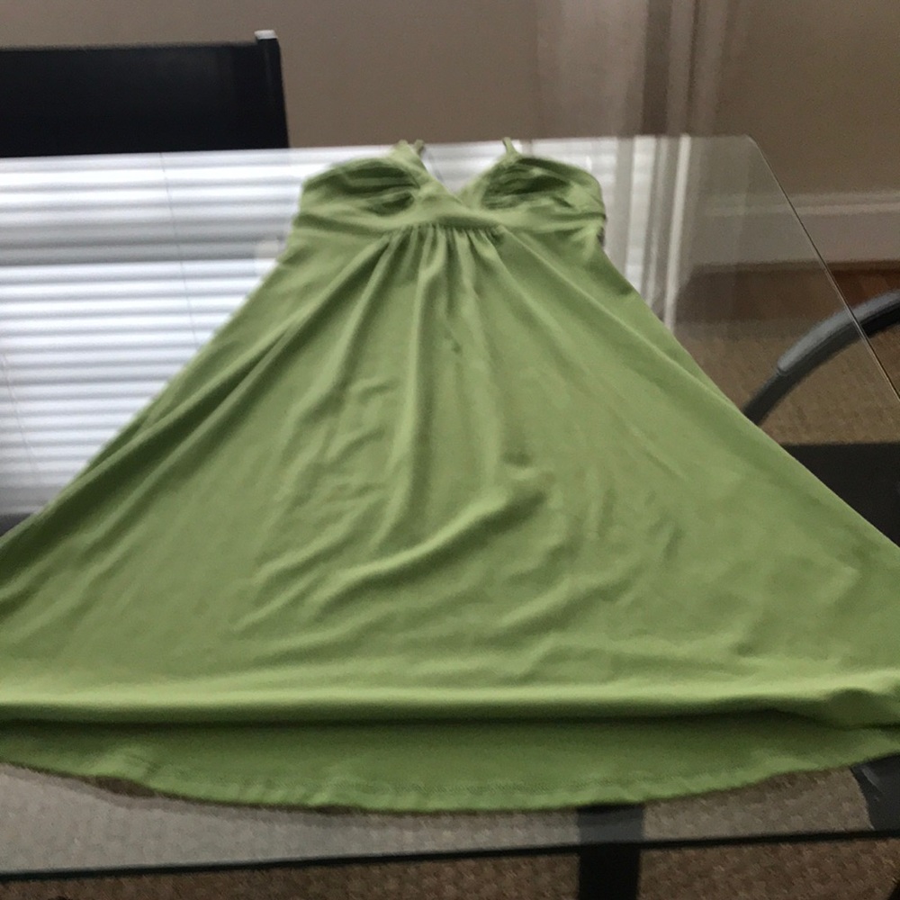 Green dress that ties around the neck.